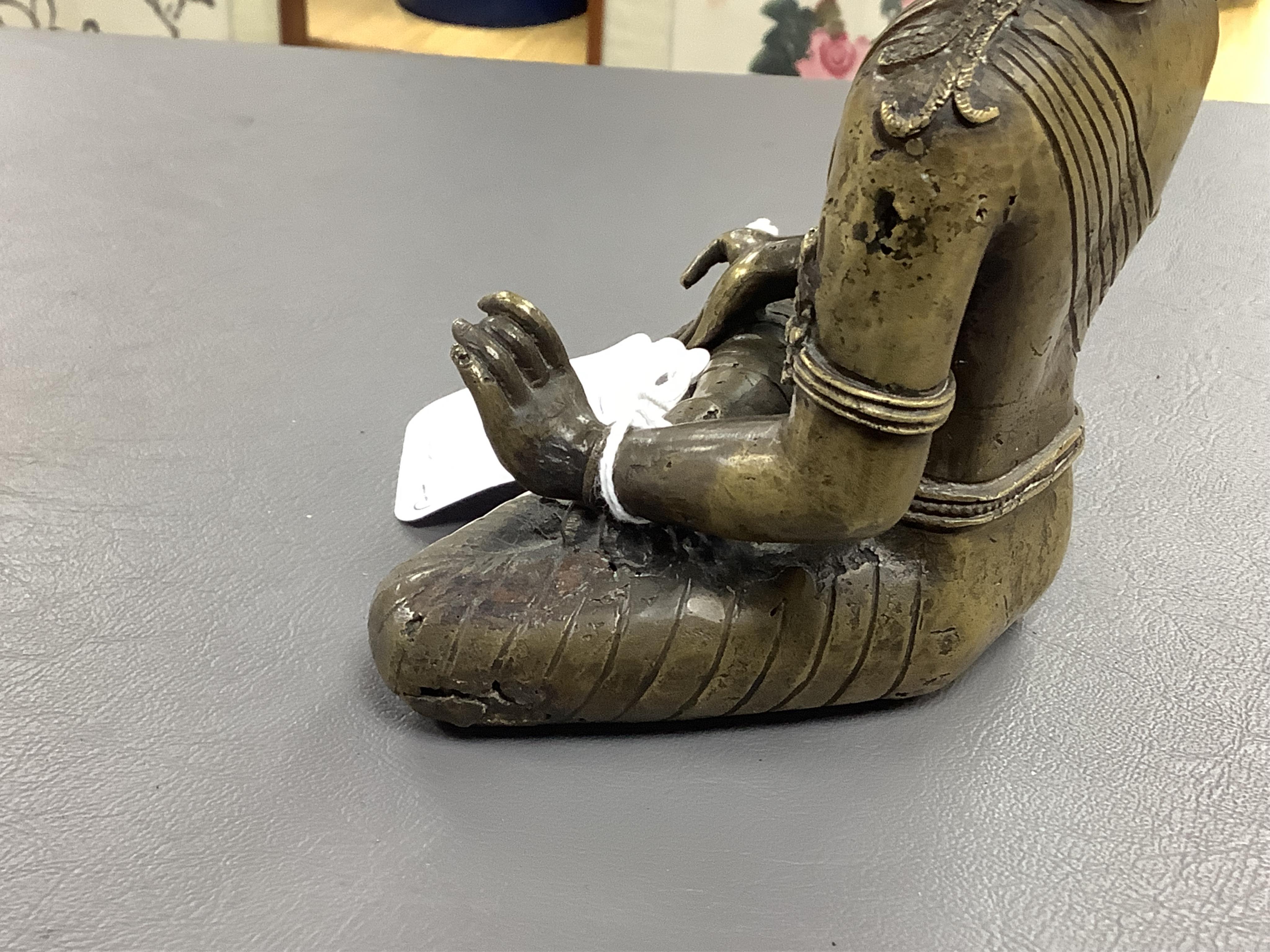 A Nepalese bronze seated figure of Avalokiteshvara, 19th century, 18cm high